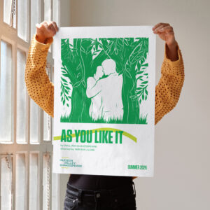 Person holding a poster for "As You Like It," featuring a green illustration of two people embracing amid trees, with event details for a summer 2026 Shakespeare festival.