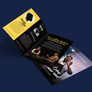 A tri-fold brochure features information about a performing arts season, including images of stage actors and event details, displayed on a dark blue background.